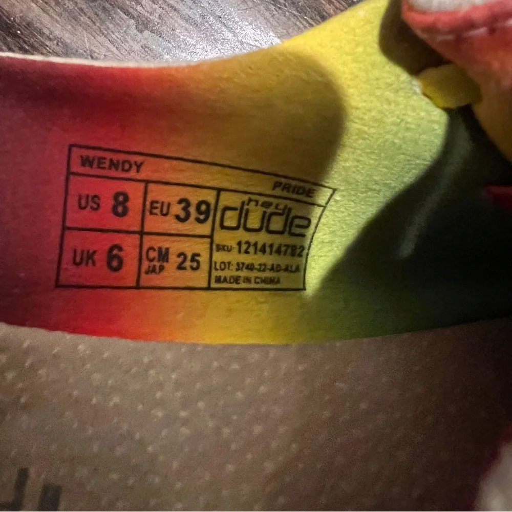 Hey Dude Light Cream Slip-On Shoes with Rainbow Accents